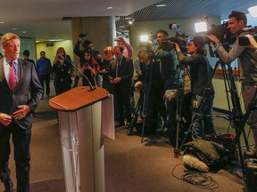 Toronto mayor John Tory speaking to media prior to leaving for Ottawa on Feb. 17, 2015. (Dave Thomas/Toronto Sun)