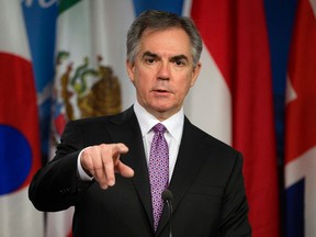 Alberta Premier Jim Prentice announces that the Province's offices in Ottawa, Chicago and Munich will be closed, during a press conference at the Alberta Legislature in Edmonton Alta., on Wednesday Feb. 18, 2015. Plans for offices in California and Brazil have been suspended. David Bloom/Edmonton Sun