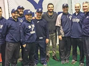 Cincinnati Reds star Joey Votto poses with some long-time friends at the Pro-Teach facility in Etobicoke.