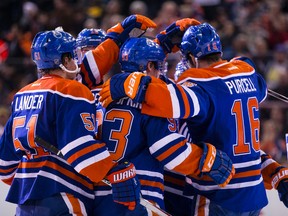 Oilers celebrate Ryan Nugent-Hopkins's first-period goal against the Bruins at Rexall Place, Feb. 19, 2015. (Ian Kucerak, Edmonton Sun)