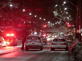 A man was shot dead by police Wednesday night in the area of 140 Spadina Rd., near Dupont subway station. (JOHN HANLEY/Special to the Toronto Sun)