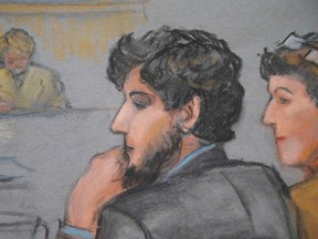 A courtroom sketch shows Boston Marathon bombing suspect Dzhokhar Tsarnaev (C) during the jury selection process in his trial at the federal courthouse in Boston, Massachusetts January 15, 2015.    REUTERS/Jane Flavell Collins