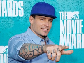 Singer Vanilla Ice, whose real name is Robert VanWinkle, arrives at the 2012 MTV Movie Awards in Los Angeles, in this file photo taken June 3, 2012.  REUTERS/Danny Moloshok/Files