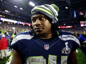 Marshawn Lynch #24 of the Seattle Seahawks walks off the field at half time during Super Bowl XLIX at University of Phoenix Stadium on February 1, 2015 in Glendale, Arizona. (Christian Petersen/Getty Images/AFP)\