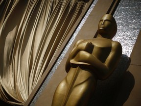 An Oscar statue is seen at the Dolby Theatre before the 87th Academy Awards in Hollywood, California February 18, 2015. The 87th Academy Awards ceremony, which honors the best films of 2014, will take place Sunday at the Dolby Theatre in Hollywood. REUTERS/Lucy Nicholson