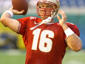 Florida State University quarterback Chris Weinke warms up prior to his team's game with Brigham Young University in the Pigskin Classic August 26, 2000, in Jacksonville, Florida. (REUTERS)
