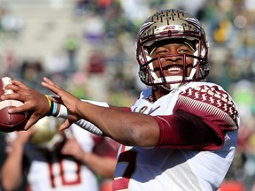 Quarterback Jameis Winston #5 of the Florida State Seminoles warms up prior to the College Football Playoff Semifinal at the Rose Bowl Game presented by Northwestern Mutual at the Rose Bowl on January 1, 2015 in Pasadena, California. (Stephen Dunn/Getty Images/AFP)