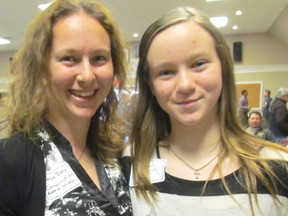 Tearza Daly and her daughter Taryn Daly, 13, received an award from the St. Clair Region Conservation Authority for shoreline garbage cleanups they've organized annually for several years at the Highland Glen Conservation Area in Plympton-Wyoming. They were among a number of recipients of awards presented at the authority's annual meeting held Thursday in Courtright. PAUL MORDEN/ THE OBSERVER/ QMI AGENCY