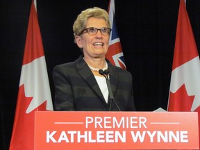 Premier Kathleen Wynne holds a media conference prior to the return of the Ontario legislature on Feb. 17, 2015. (Antonella Artuso/Toronto Sun))