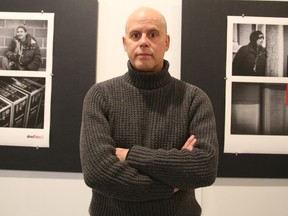 Gino Donato/The Sudbury Star
Ron Beltrame, the co-ordinator of Cambrian College’s graphic design program, stands in front of some of the images in AboutFace.2, the newest exhibit at Cambrian College’s Open Studio.