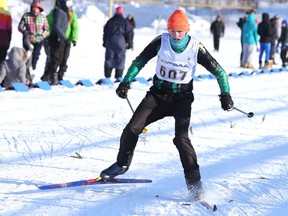 Sean Andersen of Lockerby Compssite School crosses the finnish line during the senior races at the OFSAA nordic skiing at the Laurentian University Trails on Thursday afternoon.