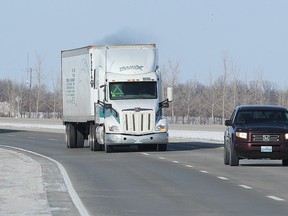 Traffic moves south along Highway 75 south of Winnipeg, Man. Wednesday Feb. 18, 2015.