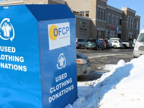 Ontario Federation for Cerebral Palsy clothing donation bins in Kingston were the target of numerous thefts and damage. (Steph Crosier/The Whig-Standard)