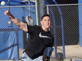 Aaron Sanchez, getting loose during an informal workout at Dunedin, says it doesn't matter to him if he starts or closes. (EDDIE MICHELS, photo)