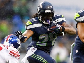 Seahawks running back Marshawn Lynch rushes against the Giants during fourth quarter NFL action in Seattle on Nov. 9, 2014. (Joe Nicholson/USA TODAY Sports)