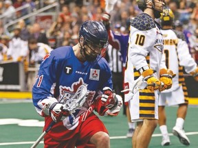Toronto Rock’s Kevin Ross pumps his fists after scoring during one of last week’s two wins over the Minnesota Swarm. (JACK BOLAND/Toronto Sun)