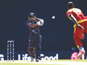 United Arab Emirates batsman Andri Berenger pulls a ball to the boundary from Zimbabwe fast bowler Tendai Chatara during Wednesday’s match. (AFP)