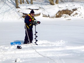 Steve Clark, a water resources specialist with the St. Clair Region Conservation Authority, is shown monitoring ice conditions in the Sydenham River watershed. Staff with the authority have been watching snowpack and ice conditions in the region to assess flood risks as the spring approaches. (SUBMITTED PHOTO)