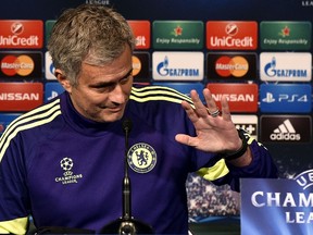 Chelsea coach Jose Mourinho gestures during a press conference at the Parc des Princes stadium in Paris on February 16, 2015. (AFP PHOTO/FRANCK FIFE)