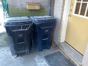The boy was found near these bins outside of an Etobicoke townhouse complex. (DAVE ABEL/Toronto Sun)