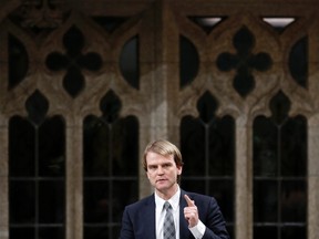 Canada's Immigration Minister Chris Alexander speaks during Question Period in the House of Commons on Parliament Hill in Ottawa, Feb. 18, 2015. (CHRIS WATTIE/Reuters)