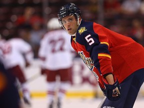 Aaron Ekblad #5 of the Florida Panthers warms up during a game against the Arizona Coyotes at BB&T Center on October 30, 2014 in Sunrise, Florida.  Mike Ehrmann/Getty Images/AFP