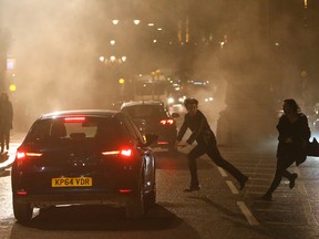Tom Cruise and Rebecca Ferguson film a scene for Mission Impossible 5 in the City of London
Credit: WENN.com
