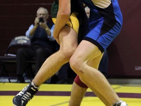 Glendale High School Gemini Ben Harvey, left, wrestles Sir Frederick Banting Secondary School's Adam Redgrift during WOSSAA wrestling in London, Ont. on Friday February 20, 2015. Harvey finished second and earned a trip to OFSAA. Greg Colgan/Woodstock Sentinel-Review/QMI Agency