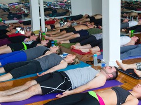 Yoga practitioners take a class at Yoga Shack on Ann St. in London on Sunday. 
Mike Hensen/The London Free Press/QMI Agency