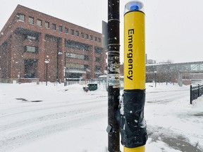 An emergency call for help station sits covered up at Algonquin College on Saturday, Feb. 21, 2015. Algonquin is one of the Ontario colleges that will see a province-wide new sex assault policy unveiled in the next month.
Matthew Usherwood/Ottawa Sun