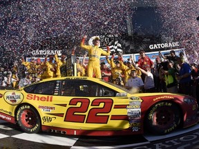 Joey Logano whoops it up with his teammates after guiding his No. 22 Team Penske Ford to victory in the Daytone 500 on Sunday. (AFP)