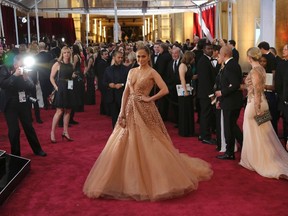 Singer Jennifer Lopez wears a dress by Elie Saab as she arrives at the 87th Academy Awards in Hollywood, California February 22, 2015.  REUTERS/Robert Galbraith