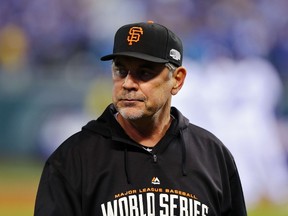 Manager Bruce Bochy was hospitalized last week to have two stents inserted into his heart. He returned to spring training on Sunday. (Elsa/Getty Images/AFP/Files)