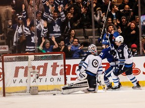 Maple Leafs winger James van Riemsdyk scores in overtime against the Winnipeg Jets on Saturday night at the Air Canada Centre. (Dave Thomas/Toronto Sun)