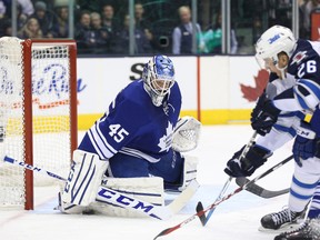 Maple Leafs goalie Jonathan Bernier makes a save against the Winnipeg Jets on Saturday night at Air Canada Centre. (USA TODAY Sports)