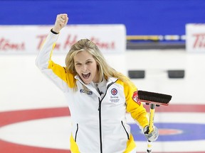Manitoba skip Jennifer Jones celebrates her gold medal after defeating Alberta's Val Sweeting during the Scotties Tournament of Hearts in Moose Jaw, Sask., on Sunday, Feb. 22, 2015. (Todd Korol/Reuters)