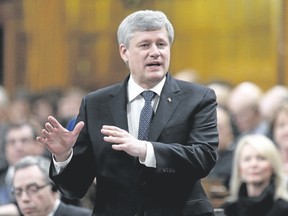 Prime Minister Stephen Harper speaks during Question Period in the House of Commons on Parliament Hill in Ottawa Feb. 18, 2015. REUTERS/Chris Wattie