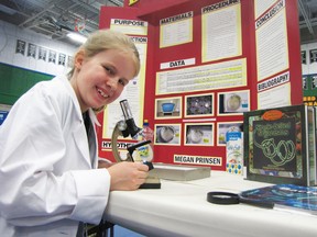 Megan Prinsen is shown in this 2012 file photo with her entry in that year's edition of the Lambton County Science Fair. This year's fair will be held April 10 and 11 in the gym at Lambton College.
FILE PHOTO / THE OBSERVER/ QMI AGENCY