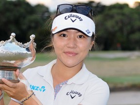 Lydia Ko of New Zealand after winning the women's Australian Open golf tournament at the Royal Melbourne Golf Club in Melbourne Feb. 22.  (AFP PHOTO / ESTHER LIM)