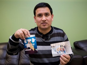 Juan Jose Ariza shows a photograph of his son, Flavio, during a language class at the Cross Cultural Learner Centre in London. Ariza, who survived a deadly crash in 2012, is still recovering from injuries. (CRAIG GLOVER, The London Free Press)