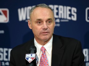 MLB commissioner Rob Manfred says he would consider a 154-game season if there was enough interest to reduce the baseball schedule. (Christopher Hanewinckel/USA TODAY Sports/Files)
