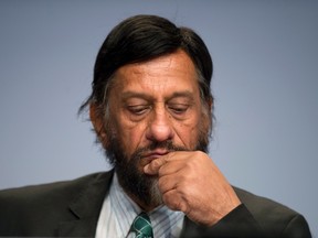 IPCC Working Group III Chairman Rajendra Pachauri attends a news conference in Berlin in this April 13, 2014 file photo. India's Pachauri stepped down on Feb. 24, 2015 as chair of the UN panel of climate scientists, the United Nations said in a statement. (REUTERS/Steffi Loos/Files)