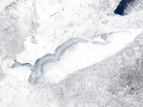 Lake Erie shown in this NASA MODIS (Moderate Resolution Imaging Spectroradiometer) satellite image captured at 1818 GMT (1318 EST) on Feb. 15, 2015 is more than 90% frozen according to the Great Lakes Environmental  Research Laboratory. (REUTERS/NASA/Handout)