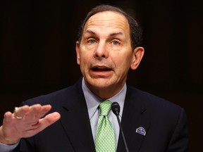 Secretary of Veterans Affairs Robert McDonald gestures as he testifies about "The State of VA Health Care" as he appears at a hearing of the U.S. Senate Committee on Veterans Affairs on Capitol Hill in Washington, Sept. 9, 2014. (REUTERS/Jim Bourg)