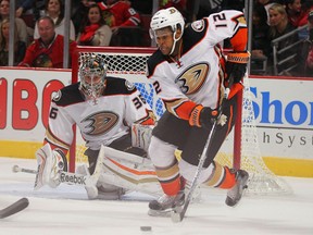 Anaheim Ducks right wing Devante Smith-Pelly (12) clears the puck during the third period against the Chicago Blackhawks at the United Center. Anaheim won 1-0. Dennis Wierzbicki-USA TODAY Sports