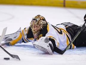 Boston goaltender Tuukka Rask makes a save during the first period of a NHL hockey game between the Edmonton Oilers and the Boston Bruins at Rexall Place on Feb. 18, 2015. (Ian Kucerak/Edmonton Sun/ QMI Agency)