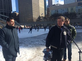 GFL president Patrick Dovigi, left, Mayor John Tory and Councillor Denzil Minnan Wong at a Tornoot ice rinks funding announcement on Friday, Feb. 20, 2015. (DON PEAT/Toronto Sun)