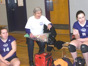Audrey Miller, a retired teacher and girls volleyball coach at West Elgin Secondary School, talks to team members last week following a game.