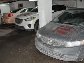 Vehicles in a parking garage of a Notre -Dame-de -Grâce apartment building were vandalized by suspects. (Sylvain Denis/QMI Agency)