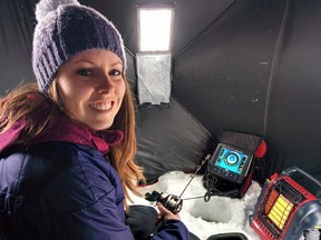 Columnist Ashley Rae on the ice in a pop-up shelter. (Supplied photo)